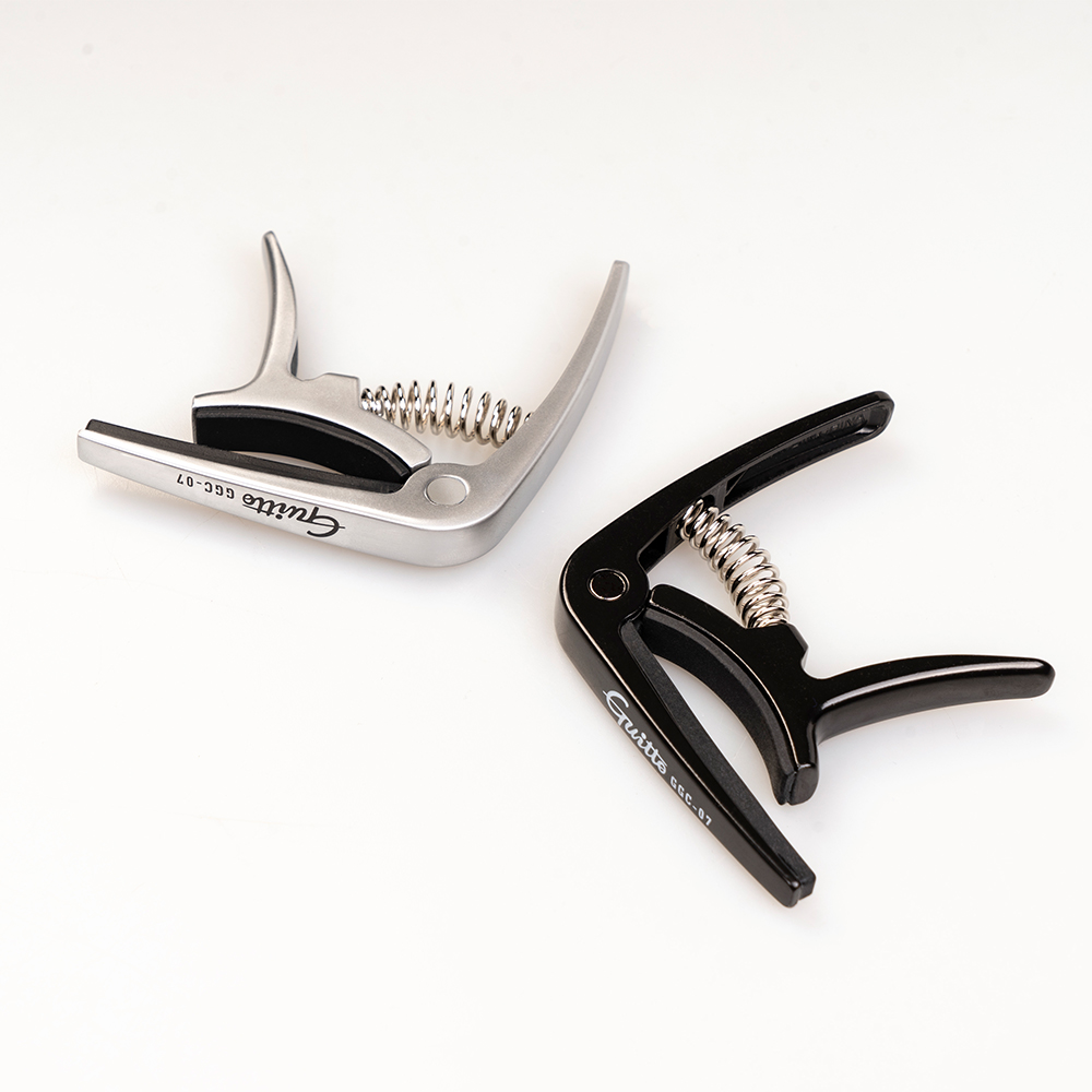 GUITTO GGC-07 Ukulele Capo Qui - Musical Instrument In English recensione e prezzo